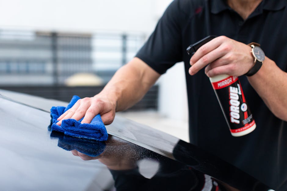 Applying protective wax to a car exterior